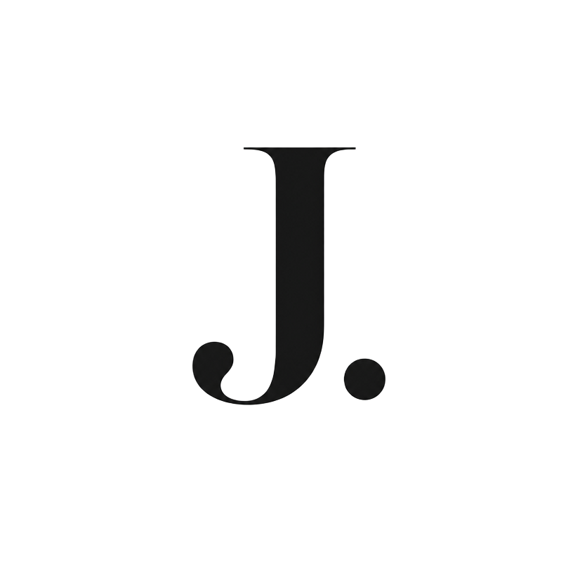 J.